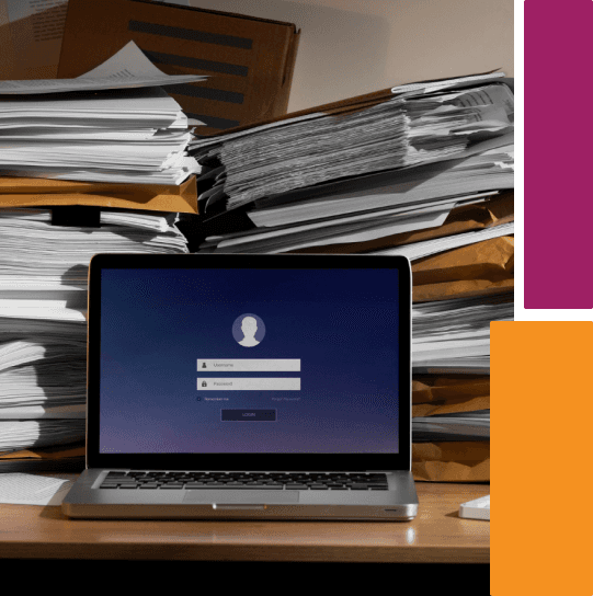 Laptop on a desk surrounded by stacks of paperwork